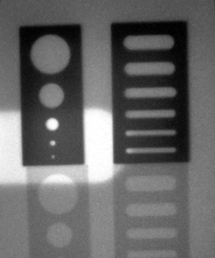 radiograph of pieces behind lead